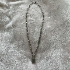 Silver necklace with lock pendant